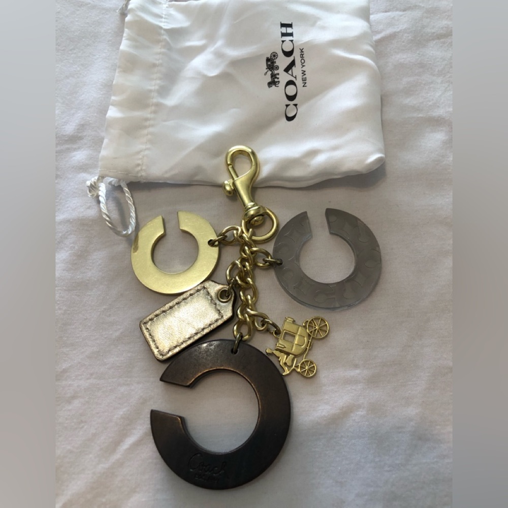 Coach bag charm brass/wood/etched plastic/silver hang tag